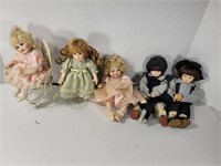 Five Small Porcelain Dolls
