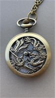 Phoenix and dragon pocket watch on 32 inch chain,