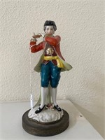 Flute Player Figurine on Metal Base