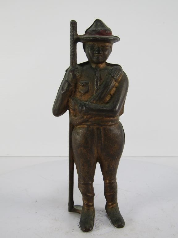 ANTIQUE METAL MOUNTIE COIN BANK