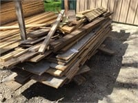 Pile of used plywood pieces.