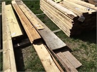 2 - Piles of 1" new & used dimension lumber.