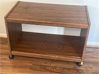 Small TV stand on casters