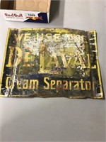 DELAVAL CREAM SEPARATOR TIN SIGN, RUSTED, 12X15.5"