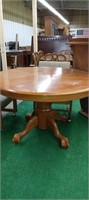 Paw foot pedestal dining table with leaf