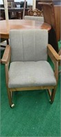 Four oak rolling dining club chairs