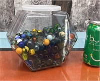 Tub of glass marbles