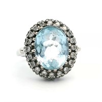 14ct WG oval aquamarine (4.37ct) & DIA ring