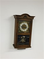 oak case wall clock - key wind w/ pendulum