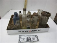 Assorted vintage bottles