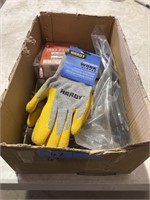 Box with miscellaneous items, work gloves, zip