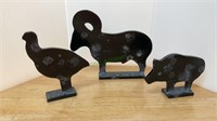 3 cast iron farm animals to include a pig, goose