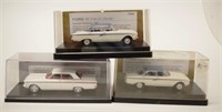 Three Ford model cars