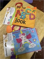 1 ABCbook and 1 unicorn book