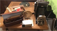 Vintage Polaroid camera and accessories