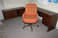 Apart two part L shaped desk with orange office ch