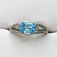 $300 Silver Blue Topaz Ring