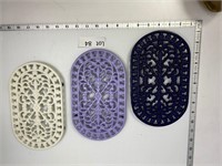 Set of Enamel Covered Cast Iron Trivets