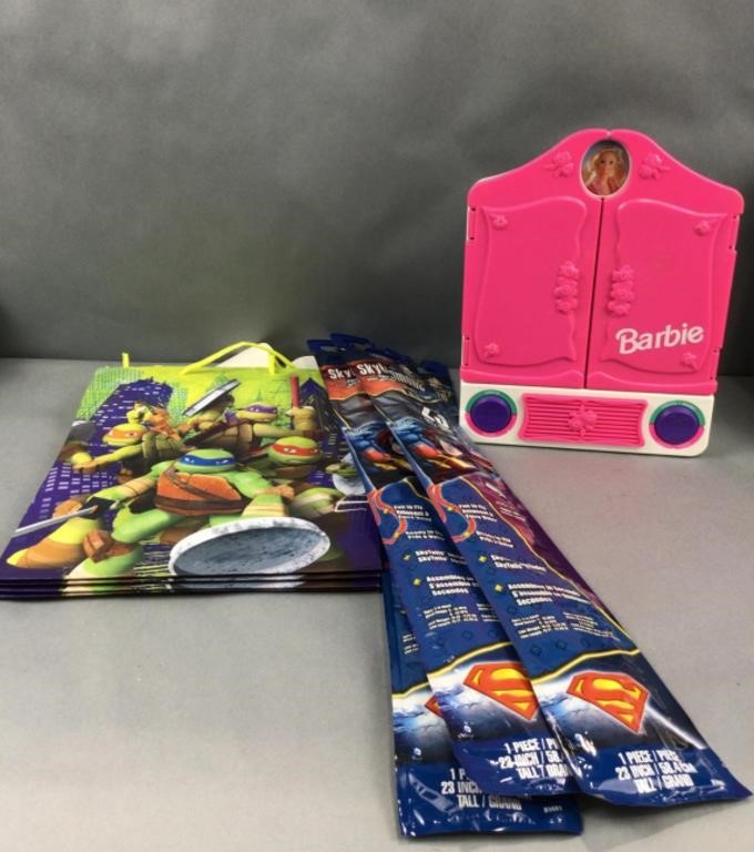 Superman kites, Barbie mirror, and TMNT bags