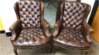 Two Tuffed Brown Leather Parlor Chairs