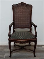 Vintage mahogany cane back arm chair