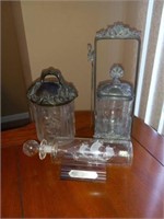 Glass ship in bottle, humidor and castor