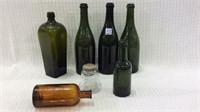 Group of 7 Old Bottles Including R.M.