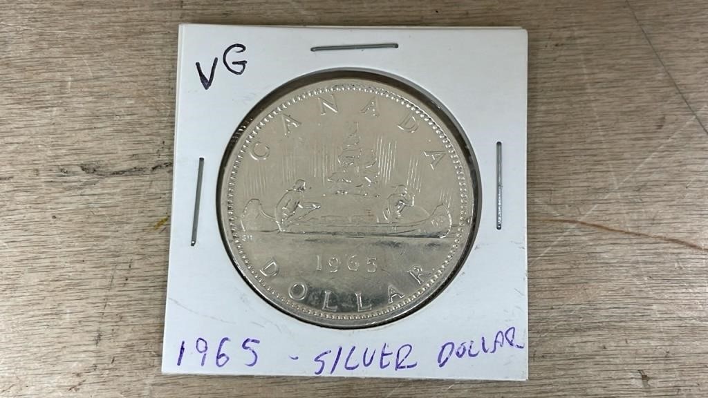 CAD 1965 Silver Dollar. *SC