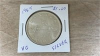 CAD 1965 Silver Dollar. *SC