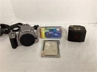 Kodak Baby Brownie, Canon, and Tevion Cameras
