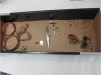 Flat of vintage jewelry