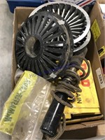Box of misc--small hubcaps, roller chain, hot iron