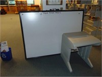 white board and a computer stand