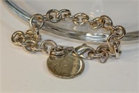 Tiffany & Co monogrammed bracelet pendant, 36.9g,