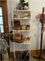 Over the toilet rack with loads of decor baskets