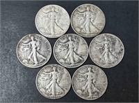 Seven Walking Liberty Half Dollars