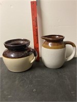 2 stoneware pitchers