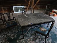 Antique dining table with five chairs