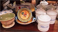 Eight pieces of art pottery kitchenware: three