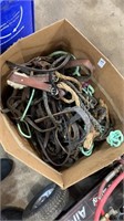 Box lot of halters, reins and other