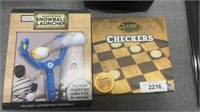 Checkers and snowball launcher