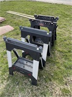 Four plastic sawhorses what does have some damage