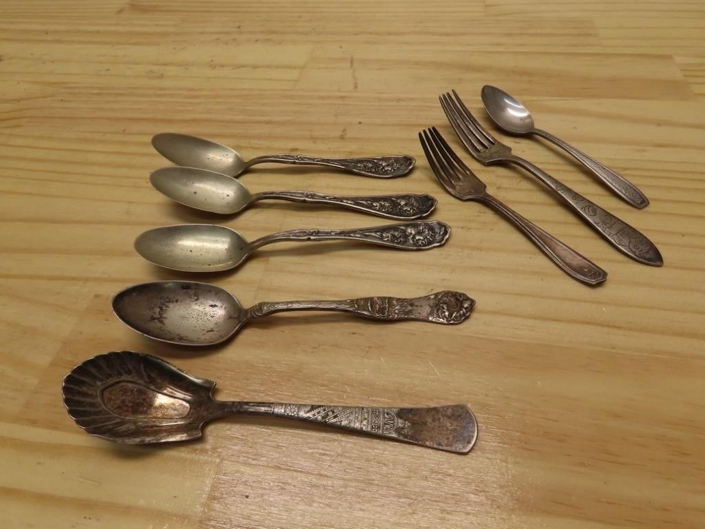 Silver plate antique spoons.