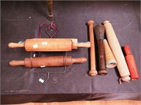 Four wooden rolling pins, wire pinholder, wooden