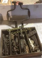 Vintage door hinges, hand drill and bits.