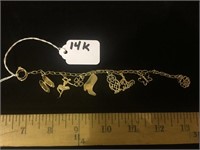 14K BRACELET WITH CHARMS HAS DAMAGE TO CHAIN