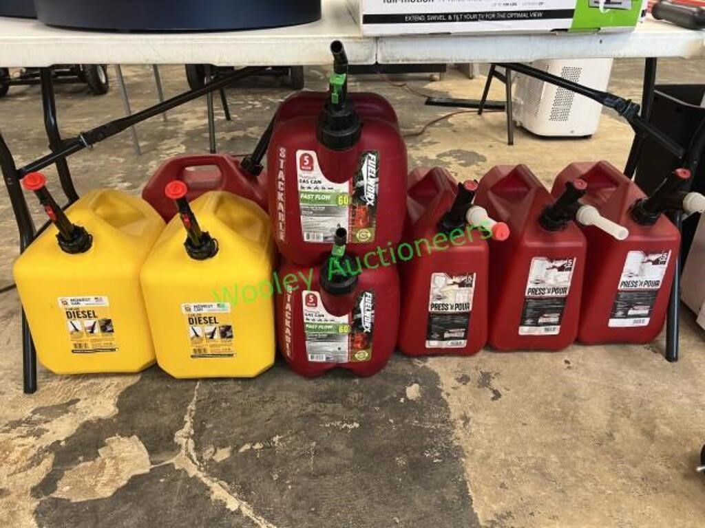 (9) Fuel Cans (2) Diesel and (7) Gas