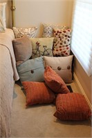 Assortment of decorative throw pillows