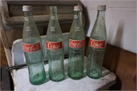 Set of Four Coke Cola Soda Bottles