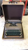 Vintage portable Smith Corona typewriter with